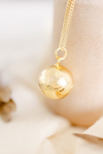 Bola de grossesse couronne de plumes CARESSE